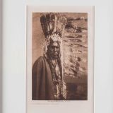 Edward S. Curtis “Piegan War-Bonnet and Coup-Stick” Photogravure
