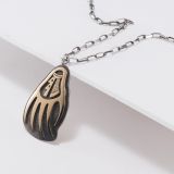 John Coochyumptewa 14Kt Gold and Sterling Bear Paw Necklace