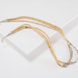Nick Rosetta Three Strand Yellow Serpentine Heishi Necklace