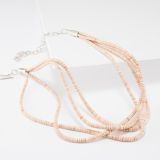 Cheyenne Grabiec Four Strand Melon Shell and Angel Skin Coral Necklace
