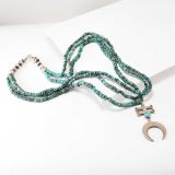 Mike Bird-Romero Beaded Turquoise Necklace with Coin Silver Pendant
